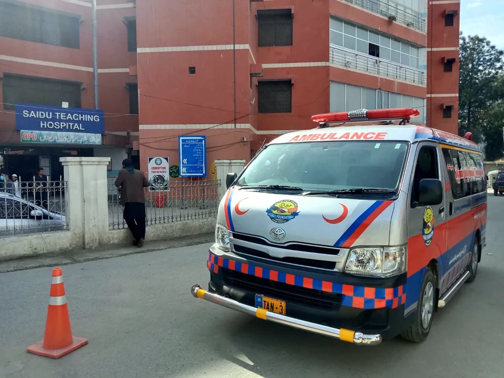 The foundation ambulance parked outside a hospital building.