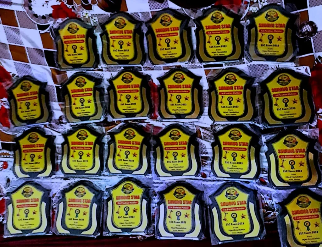 Rows of yellow Shining Star award shields.